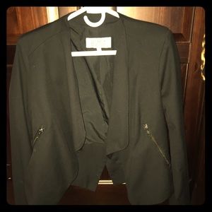 Black flowy blazer with gold zipper pockets